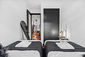 A spacious closet provides plenty of room for your wardrobe, keeping your belongings organized and the space clutter-free.