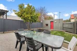 This pet-friendly stay includes a fenced front and back yard for your furry friend to play.

