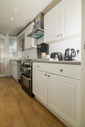 Kitchen with essential utensils