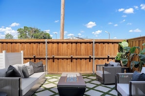Let's gather around the firepit. Throw some meat on the grill and get this vacation rocking!