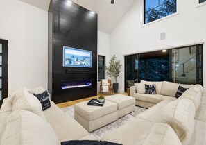 Electric fireplace with color changing lights creates a great ambiance while sitting around with friends