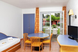 Sink into the cozy sofa after a day exploring the area.