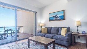 Sofa in living room with table on the balcony