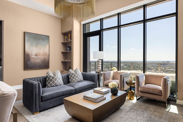 Living room featuring a 65" 4K UHD TV