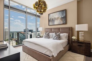 Primary suite with a king bed and a 55" 4K UHD TV