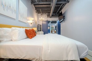 King size, adjustable bed, two side tables with sound machines. Amazing soaker tub with room divider for privacy. 65” smart TV (must sign into your own streaming accounts).