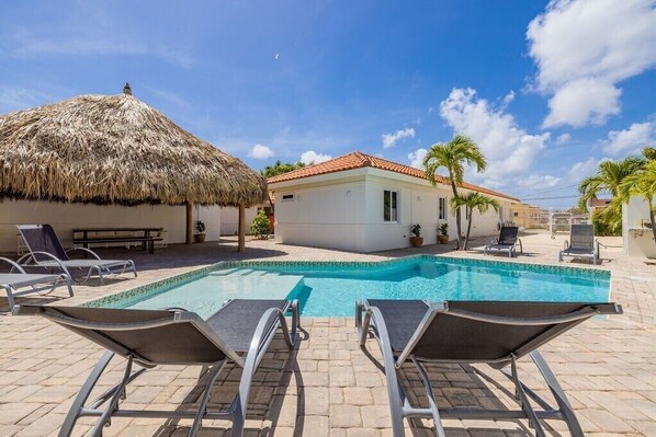 Pool deck with palapa.
Dive into paradise on our pool deck with a palapa. Bask in the sun or find shade under the traditional thatched roof, where relaxation meets tropical elegance.