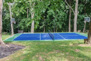 Pickleball court with basketball hoops!