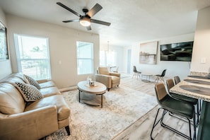 Experience warmth and style in a cozy, modern living room.