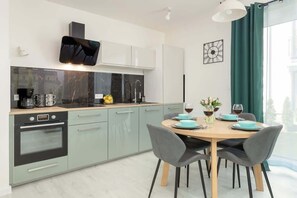 Kitchenette with an oven.