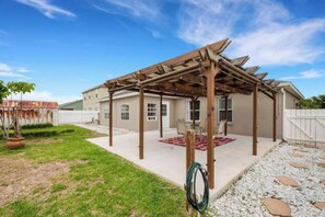 private covered backyard patio with pergola 
