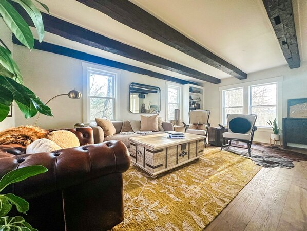 Unwind and reconnect in the living space. Coffee table is filled w/ games!