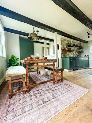 Enjoy family meals at this beautiful antique dining table