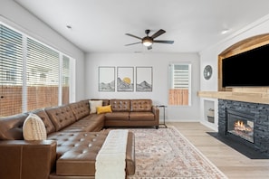 Beautiful living room with 70’” TV