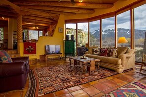 Comfortable living room with mountain views to the East