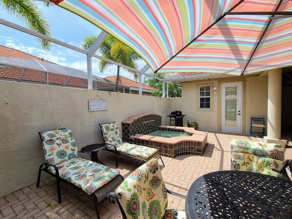 Relax spa side on these chaise loungers or dine outside in the beautiful Florida sunshine