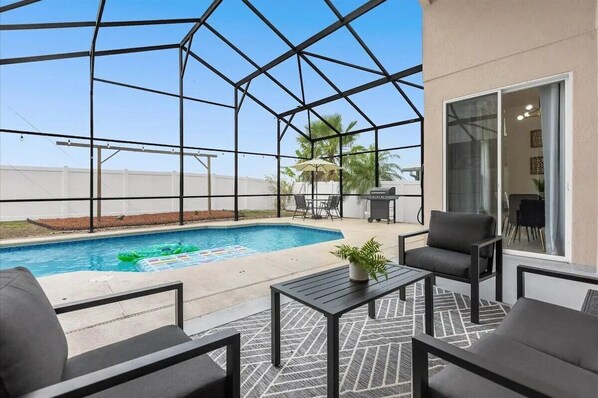 Relaxing sitting area with pool view