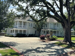 Driveway and parking in the front and back of the house.