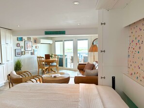 Newly redesigned with retro-inspired vibes! Relax in the cozy living space after a day at the beach — plenty of room for couples or families