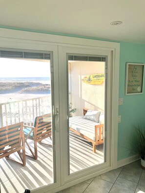 The perfect spot for afternoon naps on the daybed with the ocean breeze flowing through your hair