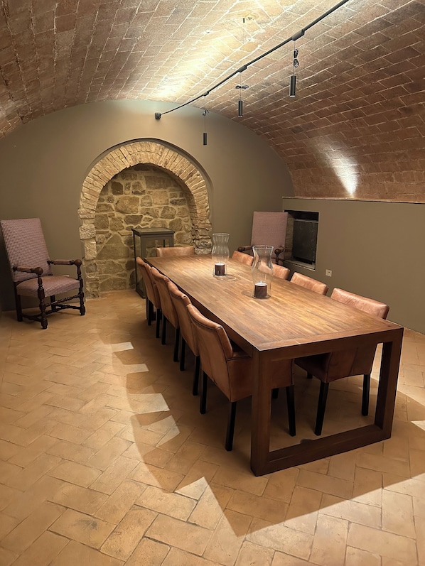 Wine cellar tasting room in the lower level of the home which seats 10.