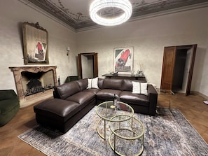 This is the living room with 65" TV and working desk.