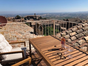 Enjoy a glass a wine on our balcony which overlooks the wine valley and hillside