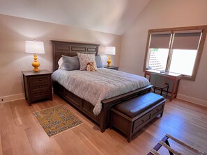 2nd floor bedroom with queen bed and desk