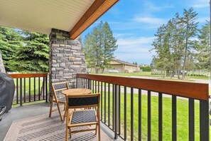 Private patio with a BBQ & bistro set.