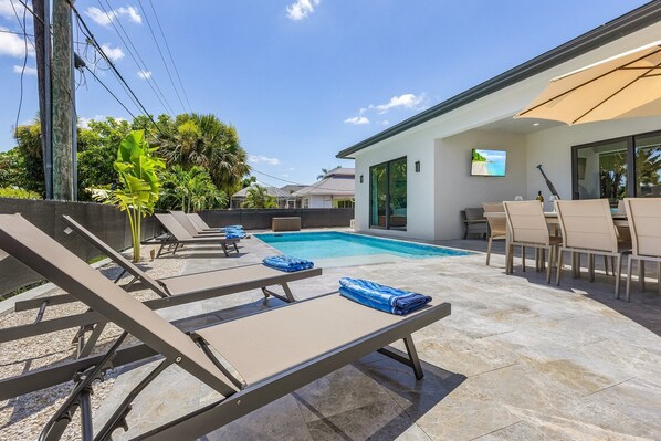 Your family can relax in this tropical oasis.