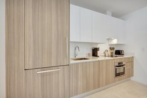 Kitchen | Modern design. Top-of-the-line appliances.  Fully stocked with all the cooking essentials.