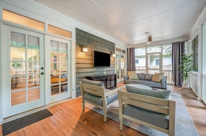 Perfect for warm Charlotte nights, the screened in patio is the ideal spot to relax and unwind. Enjoy movie night on the patio with our flat screen TV, comfortable seating, ceiling fans, as well as curtains for additional privacy.