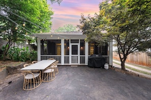Dine al fresco in our outdoor dining area for six, nestled in a beautiful wooded setting. Experience the tranquility of nature while enjoying meals with family and friends.