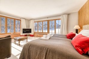Bedroom with large window front and great view