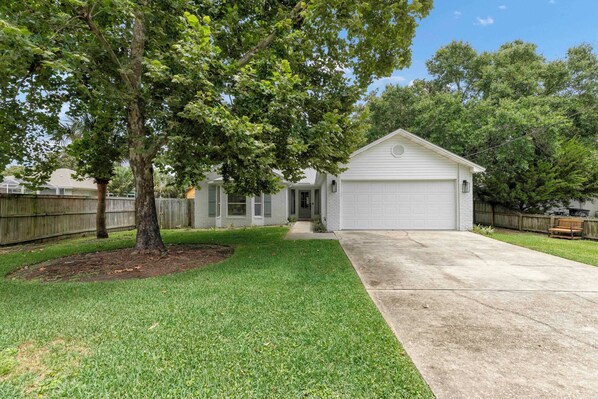 Front View w/ Four Car Driveway + 2 Car Garage