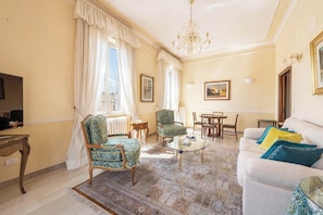 Luminous living room blends comfort and charm.