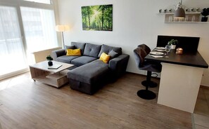 Wanderfalke- living room with  Kitchen island