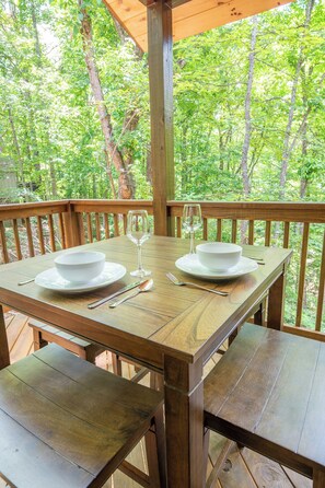 Cozy Cub Cabin's decks with relaxing views