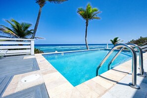 Beachfront pool with incredible shades of blue