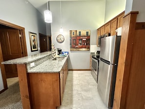 Floor, Indoors, Flooring, Refrigerator, Kitchen