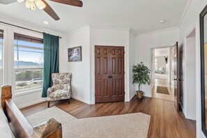 Unwind in the spacious primary suite featuring a king bed, ensuite bathroom, and soft, breathable linens. The perfect private retreat after a full day of adventure.