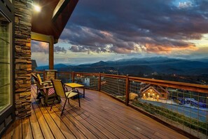 Relax on the deck and take in breathtaking mountain scenery.