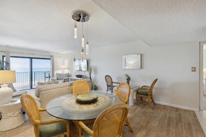 Spacious living room with cozy seating ideal for gathering and unwinding