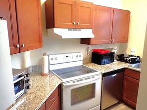 Recently remodeled kitchen, including new cabinets, countertop, stainless steel.