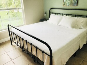 The first bedroom with king size bed and walking closet
