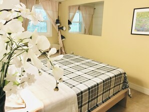 The second bedroom with queen size bed and fold sofa bed