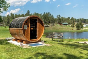 Unwind in the sauna, with nature's beauty just outside, creating a tranquil escape from the everyday hustle and bustle