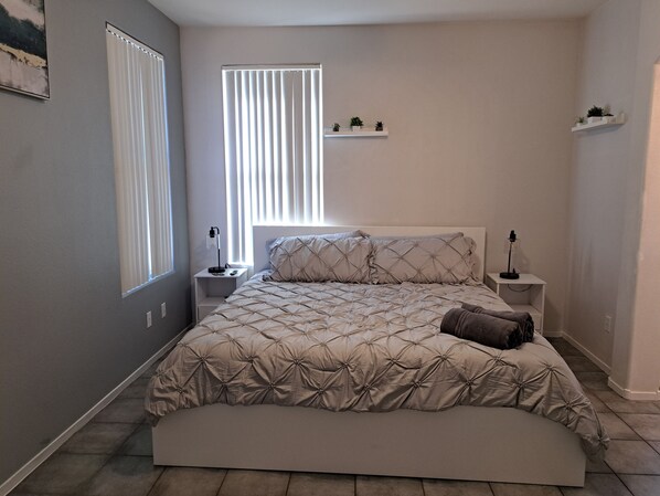 The master bedroom has a 55" smart TV.