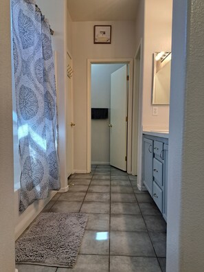 The master bedroom has a private full bathroom.