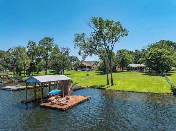 The dock on beautiful deep water. Swim/float right off the dock.